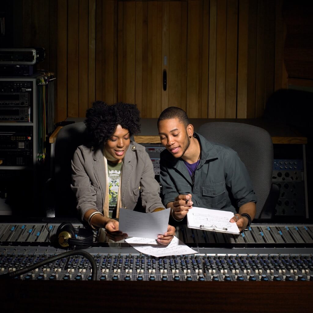 music producers working in studio